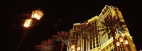 Low angle view of a hotel lit up at night, The Strip, Las Vegas, Nevada, USA Fine Art Print