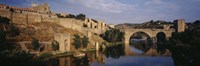 Castle at the waterfront, Puente de San Martin, Tajo River, Toledo, Spain Fine Art Print