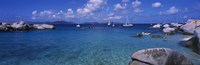 Rocks at the coast with boats in the background, The Baths, Virgin Gorda, British Virgin Islands by Panoramic Images - 27" x 9"