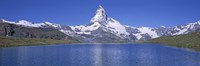 Panoramic View Of A Snow Covered Mountain By A Lake, Matterhorn, Zermatt, Switzerland by Panoramic Images - 27" x 9"