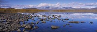 Rocks and pebbles in a lake, Torne Lake, Lapland, Sweden Fine Art Print