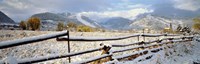 Wooden fence covered with snow at the countryside, Colorado, USA Fine Art Print
