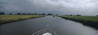 Motorboat in a Canal Friesland Netherlands