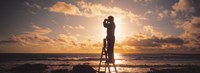 Man Looking Through Binoculars In Silhouette Fine Art Print