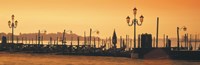 Venice, Italy Pier with Orange Sky by Panoramic Images - 27" x 9"