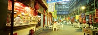 Group of people sitting outside a restaurant, Beijing, China Fine Art Print