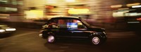 England, London, Black cab in the night Fine Art Print
