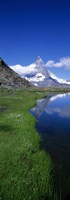 Reflection Of Mountain In Water, Riffelsee, Matterhorn, Switzerland by Panoramic Images - 9" x 27"