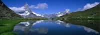 Reflection of mountains in water, Riffelsee, Matterhorn, Switzerland by Panoramic Images - 27" x 9"