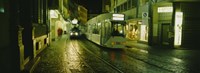 Cable Cars Moving On A Street, Freiburg, Germany Fine Art Print