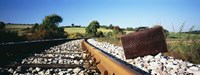 Close-up of a suitcase on a railroad track, Germany Fine Art Print