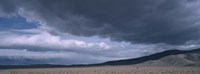 Storm clouds over a desert, Inyo Mountain Range, California Fine Art Print