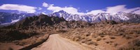 Dirt road passing through an arid landscape, Lone Pine, Californian Sierra Nevada, California, USA Fine Art Print