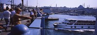 Side profile of fishermen fishing in a river, Galata Bridge, Istanbul, Turkey Fine Art Print