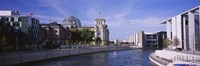 Buildings along a river, The Reichstag, Spree River, Berlin, Germany by Panoramic Images - 27" x 9"