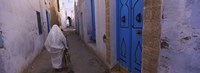 Rear view of a woman walking on the street, Medina, Kairwan, Tunisia Fine Art Print