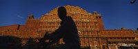 Silhouette of a person riding a motorcycle in front of a palace, Hawa Mahal, Jaipur, Rajasthan, India Fine Art Print