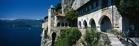 Walkway along a building at a lake, Santa Caterina del Sasso, Lake Maggiore, Piedmont, Italy Fine Art Print