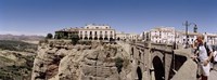 Tourists standing on a bridge, Puente Nuevo, Ronda, Malaga Province, Andalusia, Spain Fine Art Print