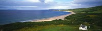 Birds-eye view of sea, white stone cottage, Northern Ireland. by Panoramic Images - 27" x 9"