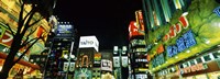Low angle view of buildings lit up at night, Shinjuku Ward, Tokyo Prefecture, Kanto Region, Japan Fine Art Print