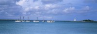Boats in the sea with a lighthouse in the background, Nassau Harbour Lighthouse, Nassau, Bahamas Fine Art Print