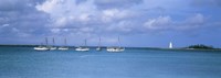 Boats in the sea with a lighthouse in the background, Nassau Harbour Lighthouse, Nassau, Bahamas by Panoramic Images - 27" x 9"