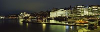 Buildings in a city lit up at night, Sodermalm, Slussplan, Stockholm, Sweden Fine Art Print