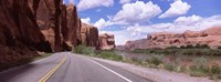 Highway along rock formations, Utah State Route 279, Utah, USA Fine Art Print