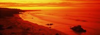 Rock formations on the beach, California (red) Fine Art Print