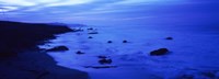 Rock formations on the beach, California (blue) by Panoramic Images - 27" x 9"