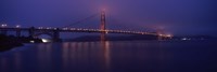 Suspension bridge lit up at dawn viewed from fishing pier, Golden Gate Bridge, San Francisco Bay, San Francisco, California, USA Fine Art Print