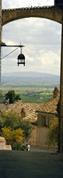 Umbrian countryside viewed through an alleyway, Assisi, Perugia Province, Umbria, Italy Fine Art Print