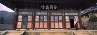 Buddhist temple with a mountain range in the background, Kayasan Mountains, Haeinsa Temple, Gyeongsang Province, South Korea Fine Art Print