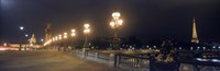 Pont Alexandre III with the Eiffel Tower and Hotel Des Invalides in the background, Paris, Ile-de-France, France by Panoramic Images - 27" x 9"