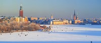 People strolling across frozen Riddarfjarden, Riddarholmen, Stockholm, Sweden Fine Art Print