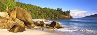 Rocks on a small beach on North Island, Seychelles Fine Art Print