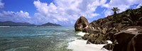 Rock formations on the beach on Anse Source d'Argent beach with Praslin Island in the background, La Digue Island, Seychelles Fine Art Print