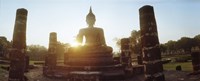 Statue of Buddha at sunset, Sukhothai Historical Park, Sukhothai, Thailand Fine Art Print