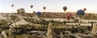 Mulit colored hot air balloons at sunrise over Cappadocia, Central Anatolia Region, Turkey Fine Art Print