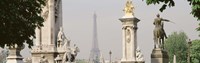 Low angle view of a statue, Alexandre III Bridge, Eiffel Tower, Paris, France Fine Art Print