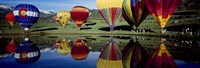 Reflection of hot air balloons in a lake, Snowmass Village, Pitkin County, Colorado, USA Fine Art Print
