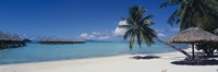 Lounge chair under a beach umbrella, Moana Beach, Bora Bora, French Polynesia by Panoramic Images - 36" x 12" - $34.99