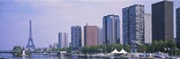 Skyscrapers at the waterfront with a tower in the background, Seine River, Eiffel Tower, Paris, Ile-De-France, France Fine Art Print