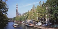 Church along a channel in Amsterdam Netherlands Fine Art Print