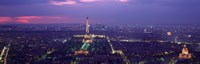 Aerial view of a city at twilight, Eiffel Tower, Paris, Ile-de-France, France Fine Art Print