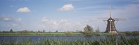 Netherlands, Traditional windmill in the village Fine Art Print