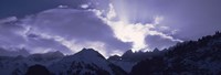 Switzerland, Canton Glarus, View of clouds over snow covered peaks Fine Art Print