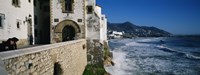 Tourists in a church beside the sea, Sitges, Spain by Panoramic Images - 36" x 12"