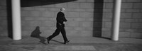 Side Profile Of A Businessman Running With A Briefcase, Germany Fine Art Print